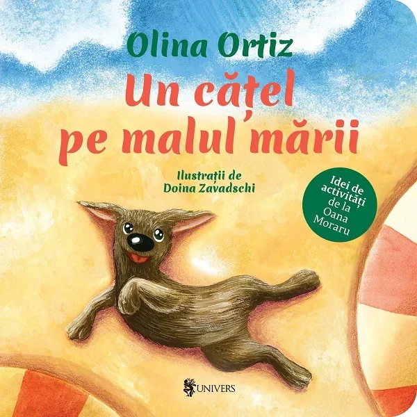 Un catel pe malul marii